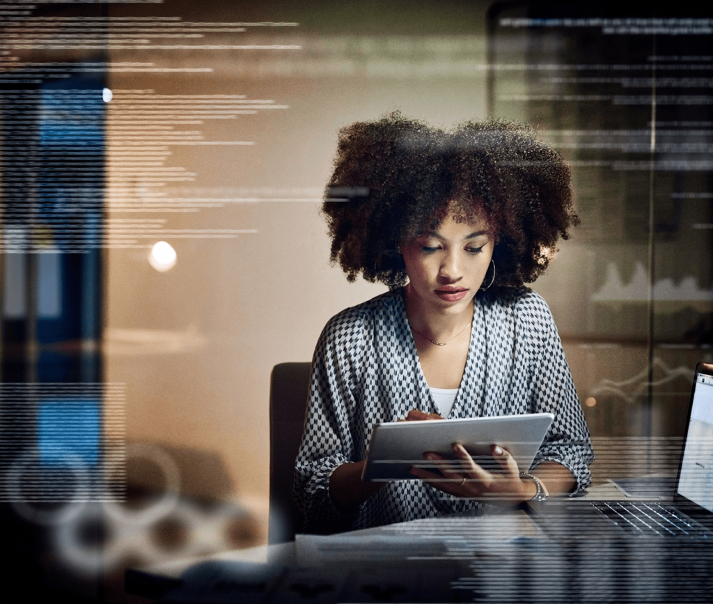 Woman reviewing information on tablet shown as the information is superimposed on the photo.