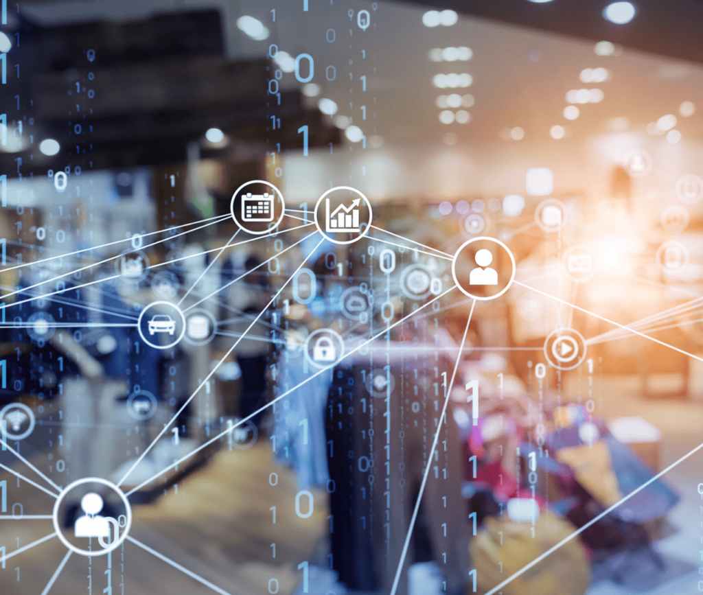 Data concept showing several icons and connected lines along with binary code superimposed over a blurry office meeting room background.